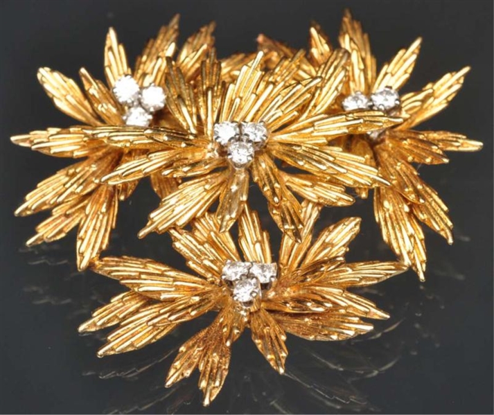 18K Y. GOLD PIN WITH 12 SMALL DIAMONDS.           