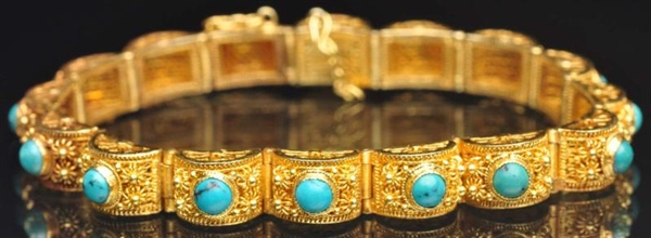 14K Y. GOLD BRACELET WITH TURQUOISE STONES.       