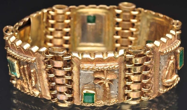 18K Y. GOLD MEXICAN THEME BRACELET WITH EMERALDS. 
