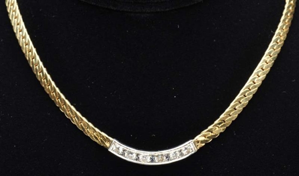 14K Y. GOLD NECKLACE WITH DIAMONDS.               