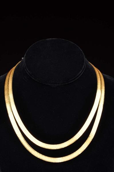 18K Y. GOLD DOUBLE STRANDED NECKLACE.             