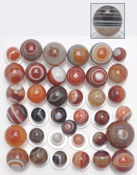 LOT OF 38: AGATE MARBLES.                         