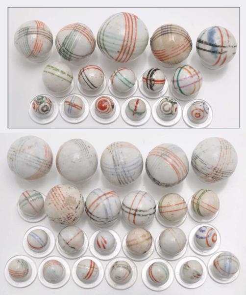 LOT OF 40: LINED & HELIX CHINA MARBLES.           
