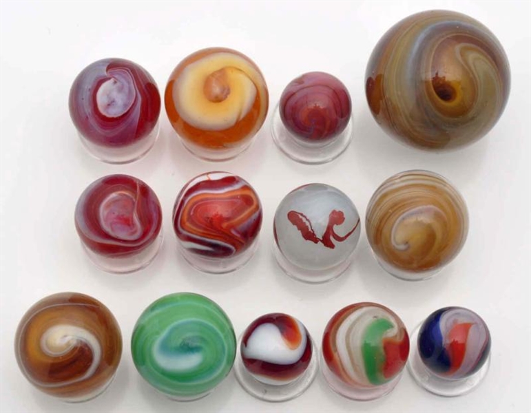 LOT OF 13: MACHINE MADE MARBLES.                  