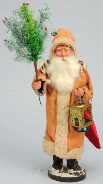 SANTA CANDY CONTAINER HOLDING FIR TREE & LANTERN. 