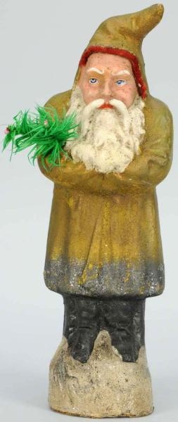 PAPER MACHE BELSNICKLE WITH GOLD COAT.            