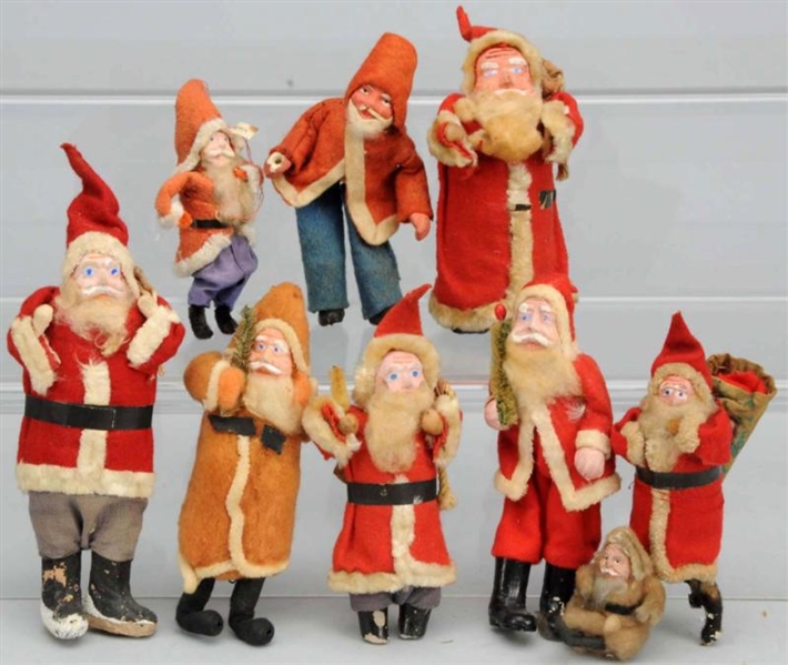 LOT OF 9: SANTAS WITH COMPOSITION FACES.          