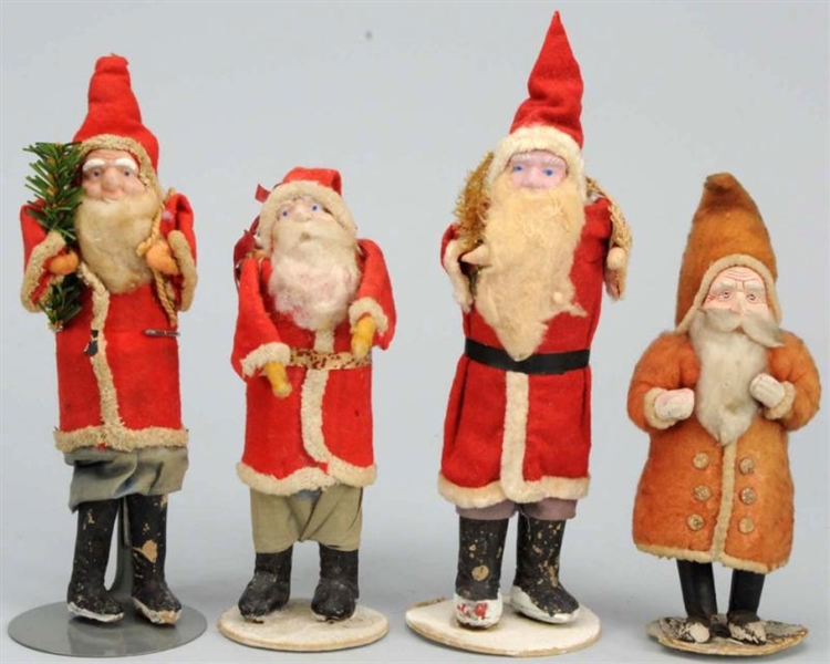 LOT OF 4: SANTAS WITH COMPOSITION FACES.          