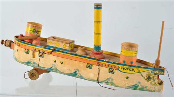 EARLY PAPER ON WOOD TOY BATTLESHIP.               