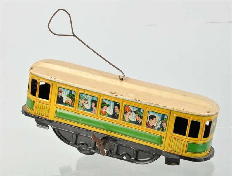 TIN LITHO TROLLEY CAR WIND-UP TOY.                