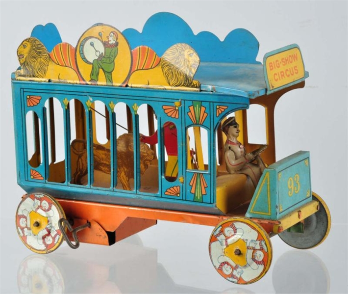 TIN LITHO STRAUSS CIRCUS TRUCK WIND-UP TOY.       