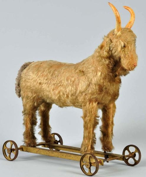 LARGE MOHAIR-COVERED GOAT CHILDS PULL TOY.       