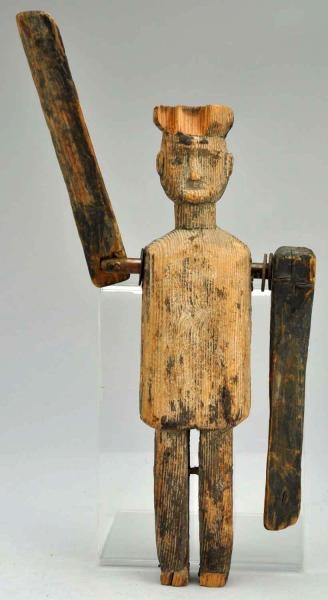 EARLY PRIMITIVE WOODEN WHIRLIGIG.                 