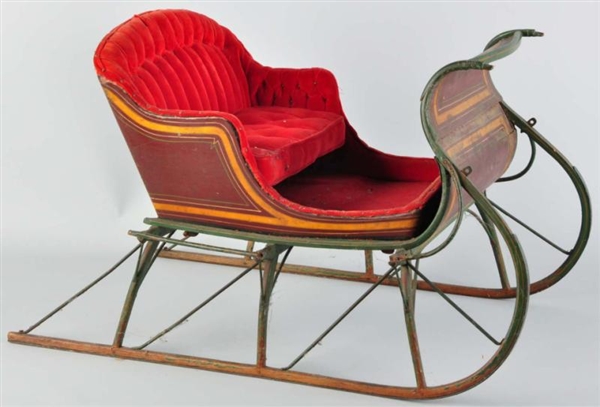 WOODEN CHILDS SLEIGH WITH RED VELVET.            