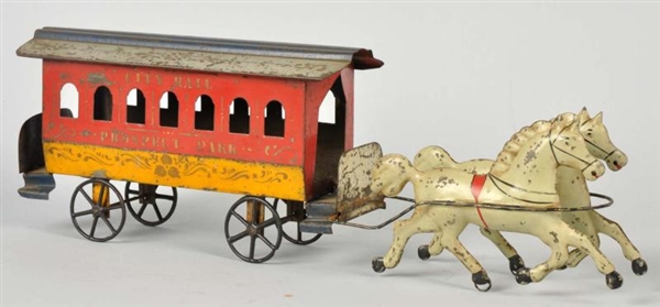 EARLY TIN HORSE-DRAWN TROLLEY TOY.                
