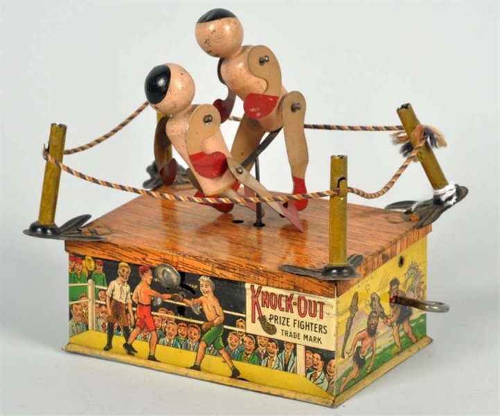 TIN LITHO STRAUSS KNOCK-OUT BOXING WIND-UP TOY.   