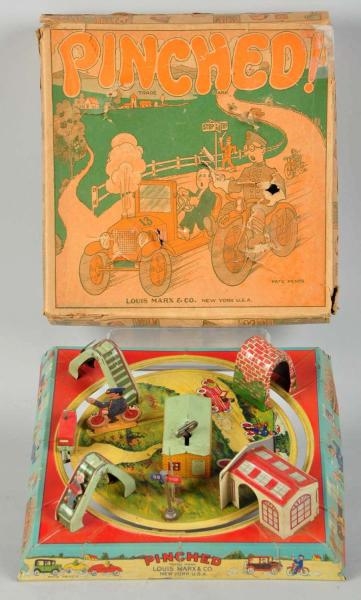 TIN LITHO MARX PINCHED WIND-UP TOY.               
