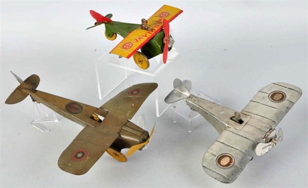 LOT OF 3: TIN AIRPLANE WIND-UP TOYS.              