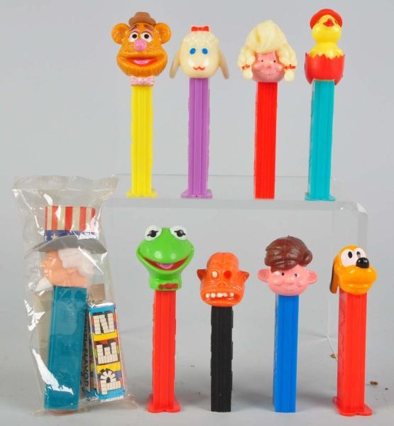 LOT OF 9: EARLY CHARACTER PEZ DISPENSERS.         