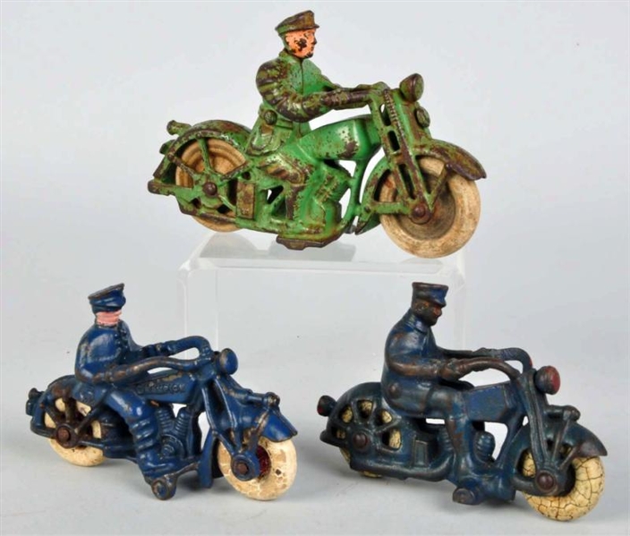 LOT OF 3: CAST IRON MOTORCYCLE TOYS.              