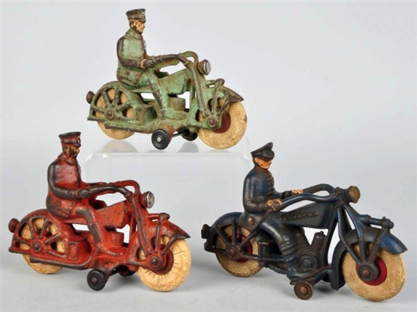 LOT OF 3: CAST IRON MOTORCYCLE TOYS.              