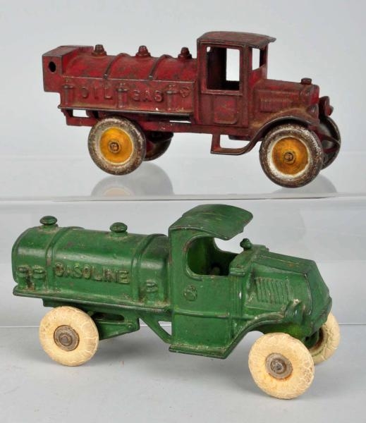 LOT OF 2: CAST IRON GASOLINE TRUCK TOYS.          