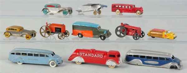 LOT OF 11: DIECAST & TIN VEHICLE TOYS.            