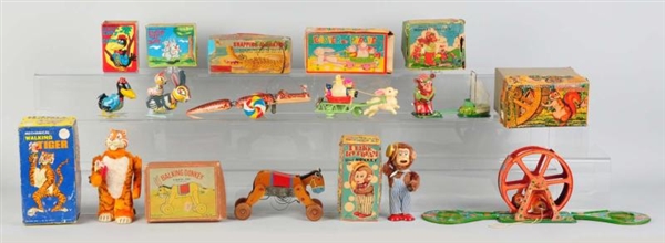 LOT OF 9: ANIMAL WIND-UP TOYS.                    