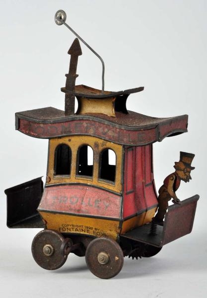 TIN LITHO NIFTY TOONERVILLE TROLLEY WIND-UP TOY.  