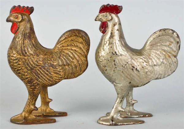 LOT OF 2: CAST IRON ROOSTER STILL BANKS.          