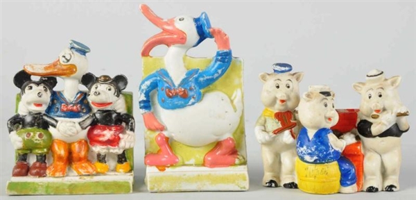 LOT OF 3: DISNEY CHARACTER TOOTHBRUSH HOLDERS.    