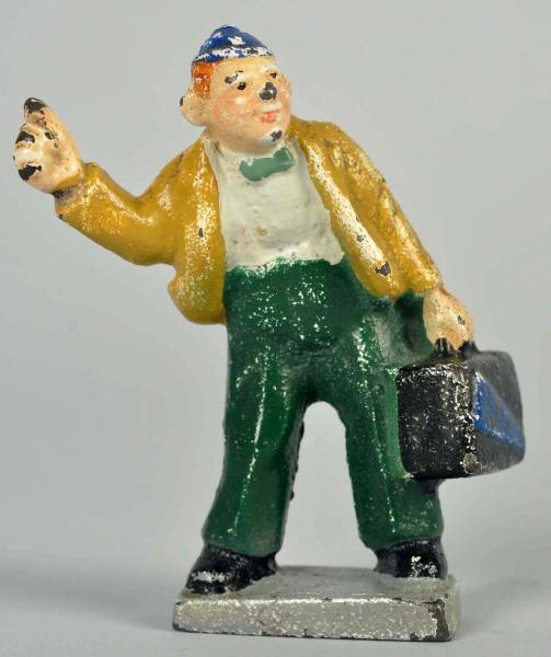 CAST IRON HITCHHIKING COLLEGE BOY PAPERWEIGHT.    