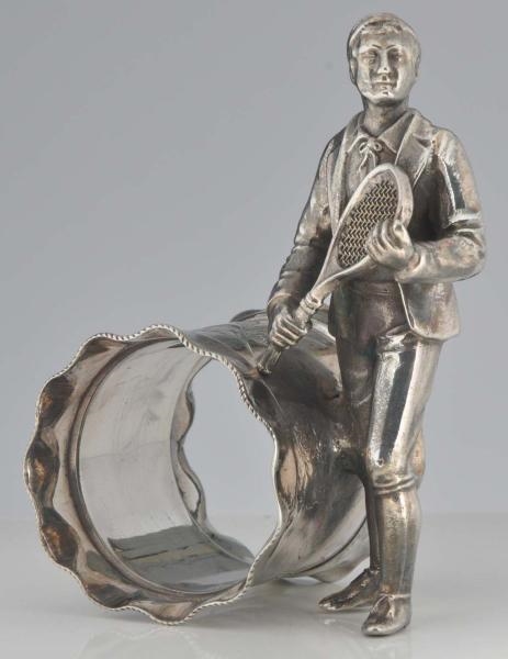 MALE TENNIS PLAYER FIGURAL NAPKIN RING.           