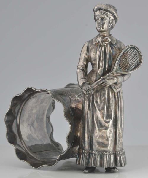 FEMALE TENNIS PLAYER FIGURAL NAPKIN RING.         