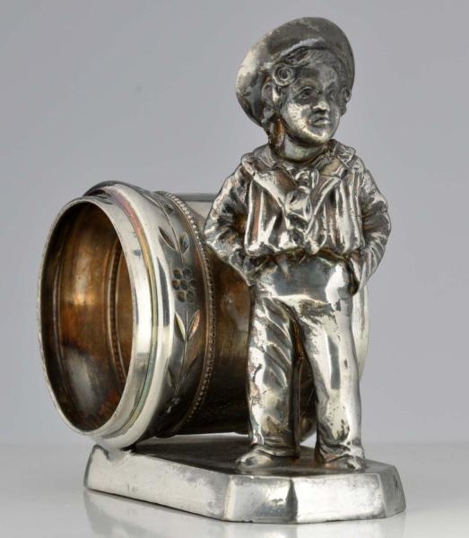 SAILOR STANDS IN FRONT FIGURAL NAPKIN RING.       
