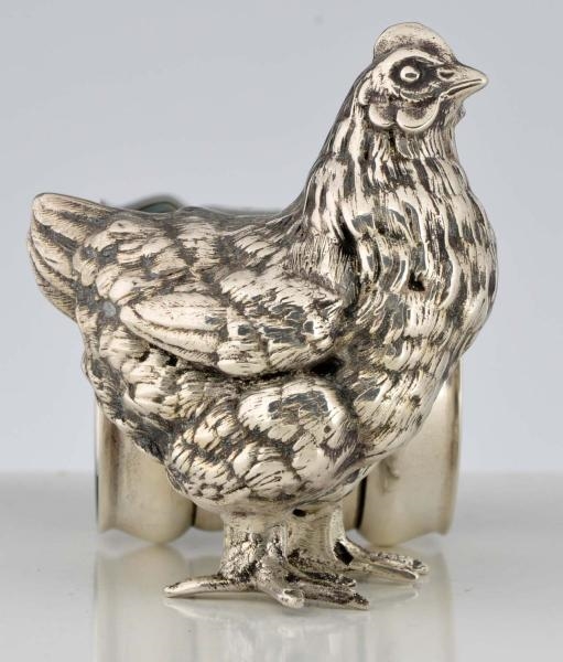 STANDING HEN BY HOLDER FIGURAL NAPKIN RING.       