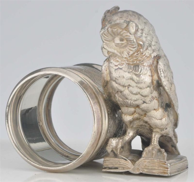 OWL STANDS ON BOOK FIGURAL NAPKIN RING.           
