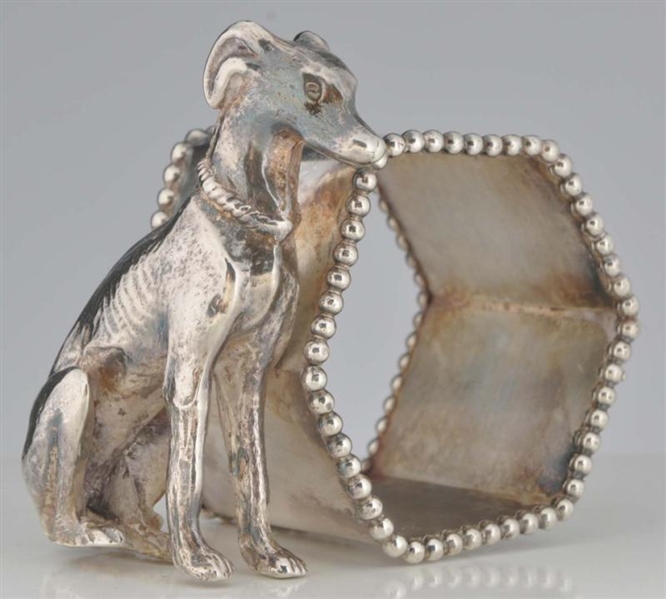 GREYHOUND OR WHIPPET FIGURAL NAPKIN RING.         