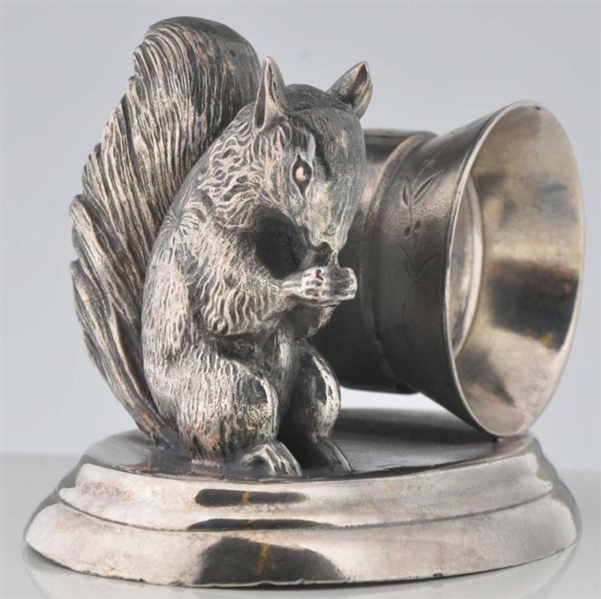 LARGE SQUIRREL WITH NUT FIGURAL NAPKIN RING.      