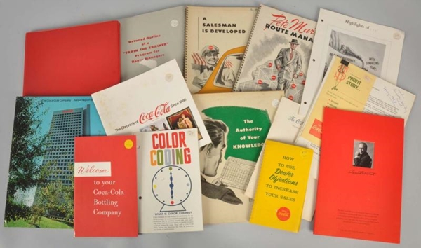 ASSORTED GROUP OF COCA-COLA PAPER ITEMS.          