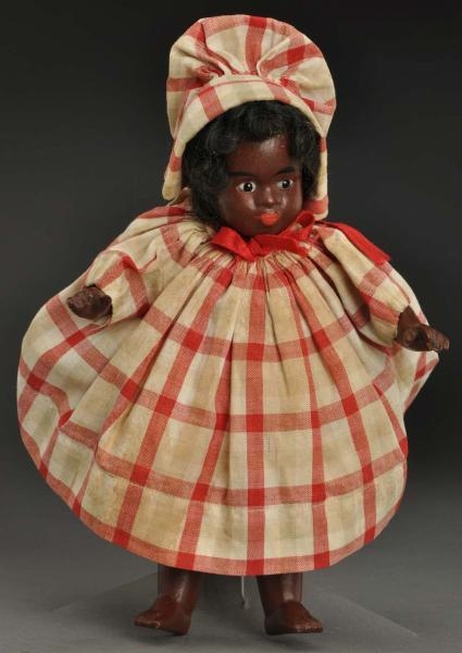 RARE BLACK ALL-BISQUE CHARACTER DOLL.             