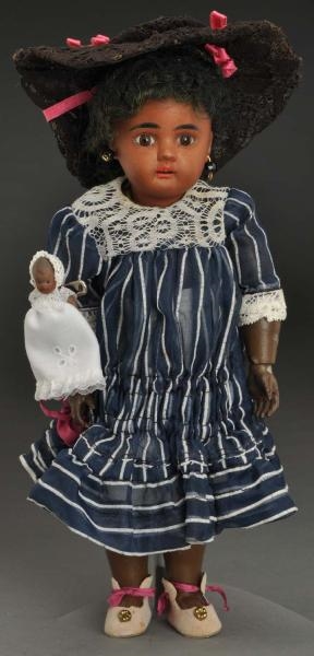WINSOME BROWN BISQUE CHILD DOLL.                  