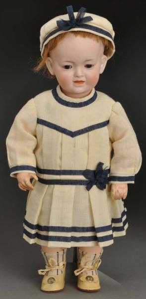 SMILING GERMAN CHARACTER CHILD DOLL.              