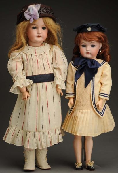 LOT OF 2 BISQUE DOLLS.                            