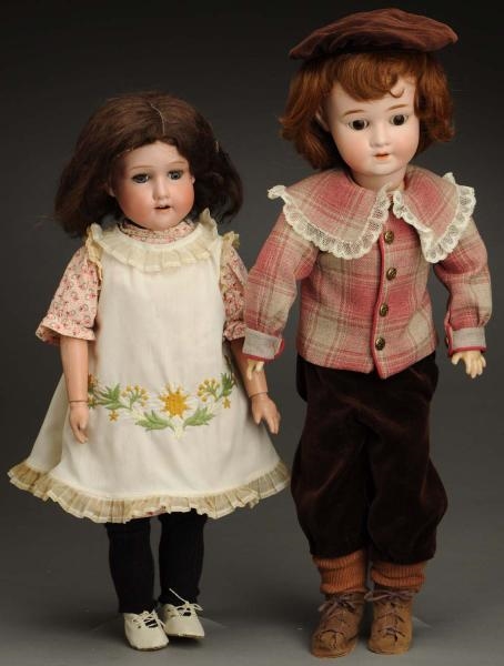 LOT OF 2 BISQUE DOLLS.                            