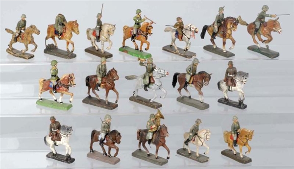 LOT OF 17: ELASTOLIN & OTHER MOUNTED SOLDIERS.    