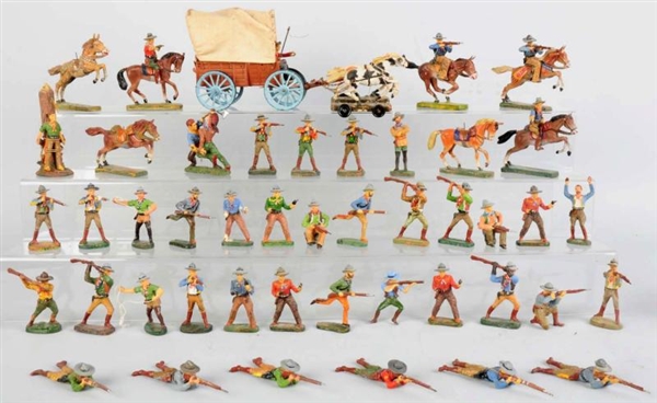 LARGE LOT OF ELASTOLIN COWBOYS & A COVERED WAGON. 