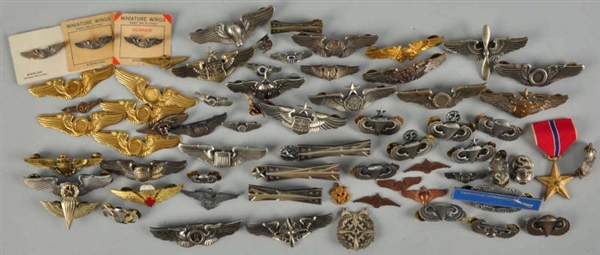 LARGE LOT OF US MILITARY WING PINS.               