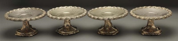 A SET OF FOUR TIFFANY SILVER COMPOTES.            