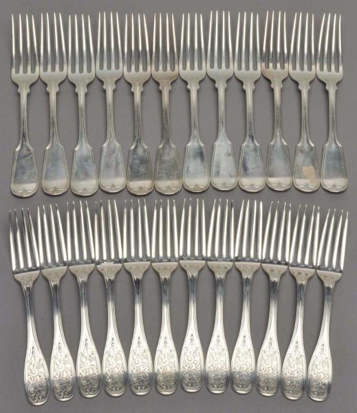 TWO SETS OF TWELVE AMERICAN SILVER FORKS.         